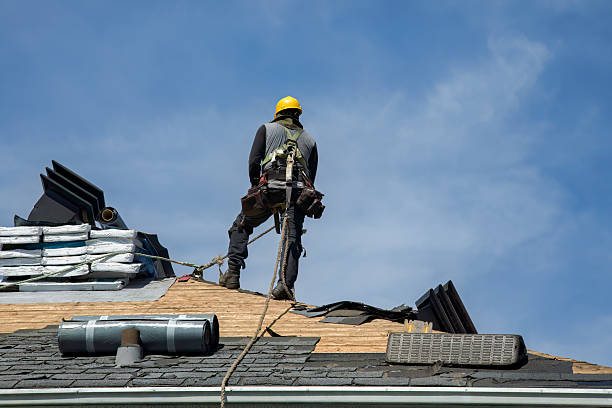 Professional Roof Replacement technician working in Martville, NY